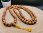 Preview: Sandelholz Mala mit 108+1 Perlen (10mm) – handgefertigt in Nepal mit traditionellem Knoten